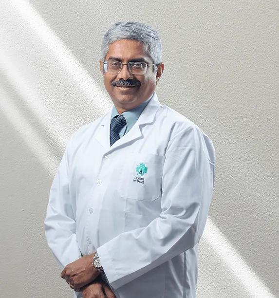 Dr. Mohan Menon